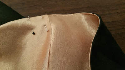 Edge stitching the cape hem