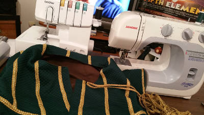 Putting trim on the body of the doublet