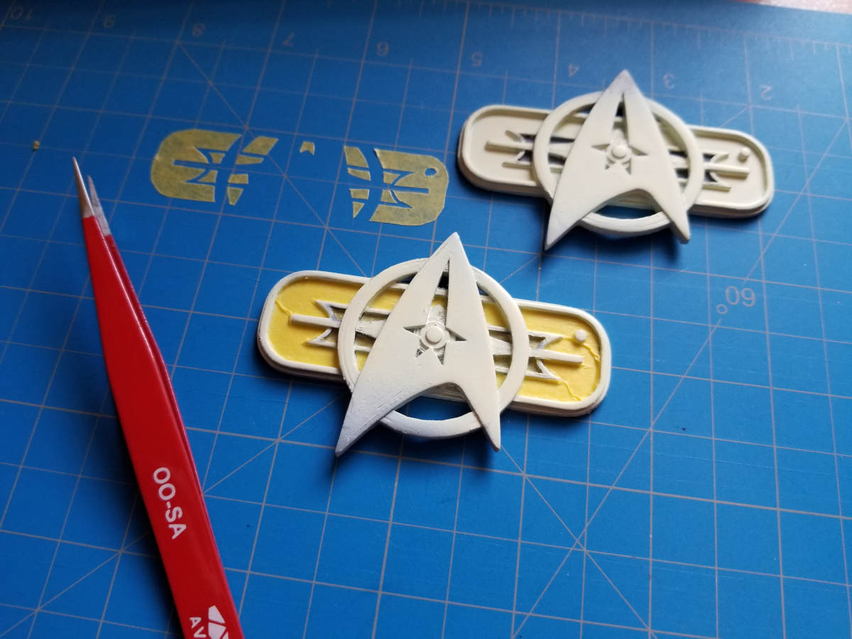 October 17, 2019: Masking the chest badges for painting